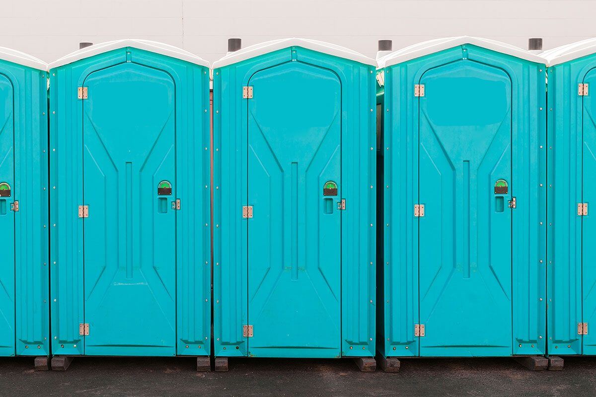 Industrial portable restroom units at a plant in McAllen, Texas